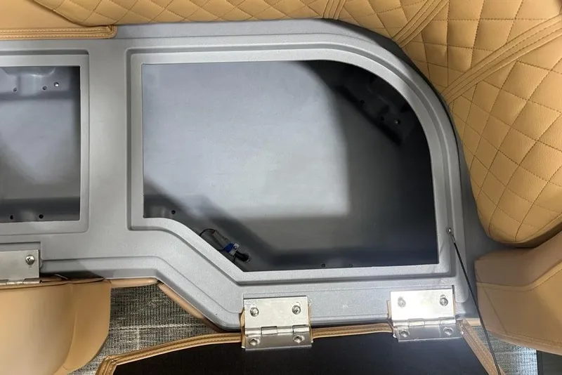 Slide: The Image of Interior view of 2025 Godfrey Sweetwater 2286 SB boat with tan quilted seating. - 10