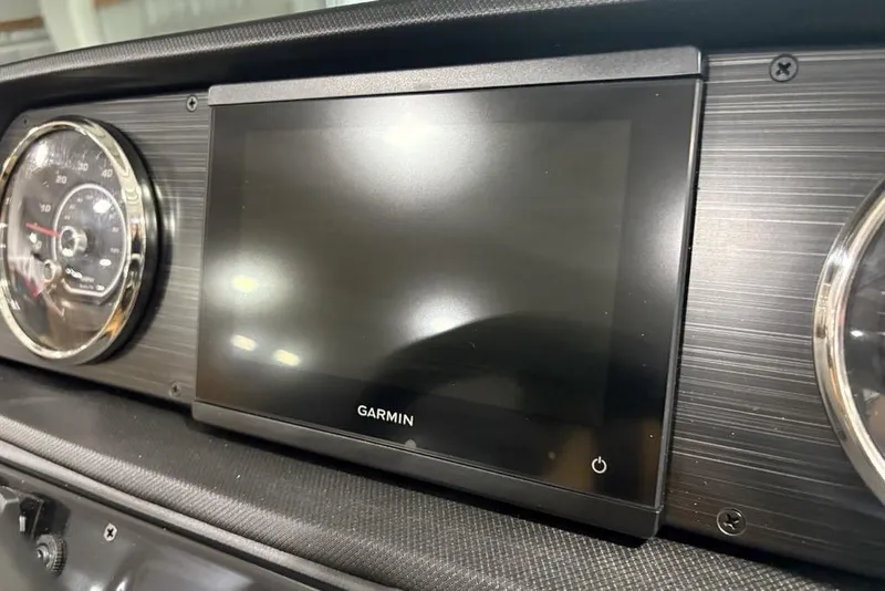 Slide: The Image of Dashboard of 2025 Godfrey Sweetwater 2286 SB with Garmin display and gauges. - 23