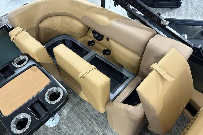 Slide: The Image of Luxurious tan seating in 2025 Godfrey Sweetwater 2286 SB pontoon boat with cup holders. - 31