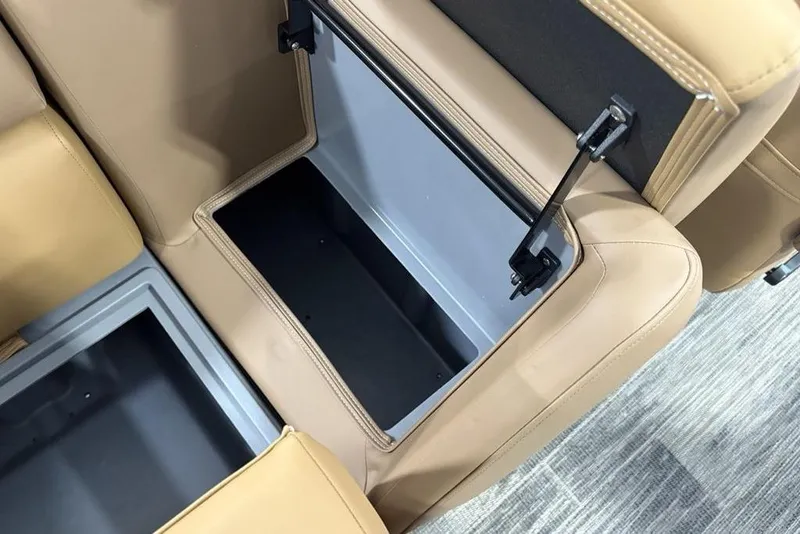 Slide: The Image of Storage compartment in 2025 Godfrey Sweetwater 2286 SB boat with tan upholstery. - 37