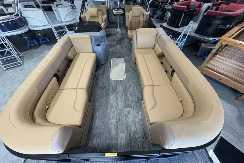 Slide: The Image of 2025 Godfrey Sweetwater 2286 SB pontoon boat interior with tan seating and modern design. - 39