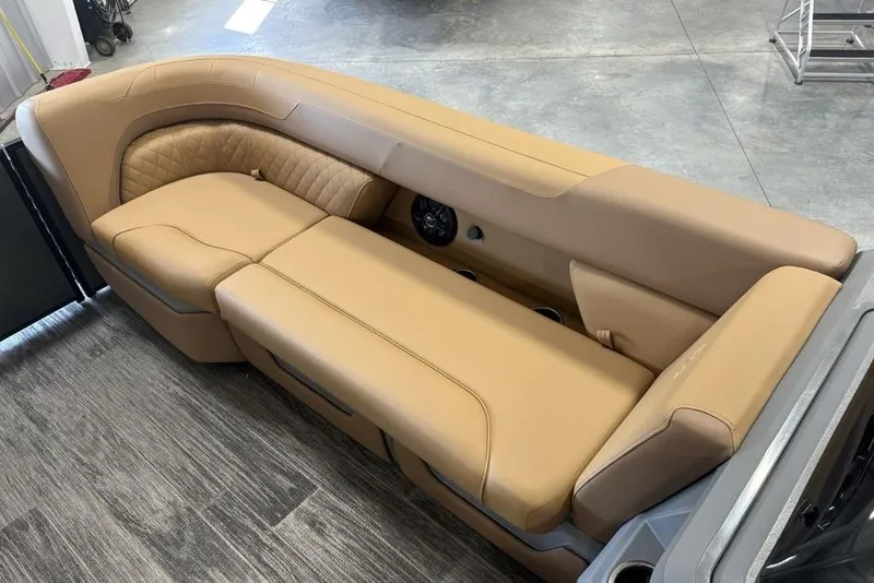 Slide: The Image of Luxurious tan seating on 2025 Godfrey Sweetwater 2286 SB pontoon boat, showcasing comfort and style. - 6