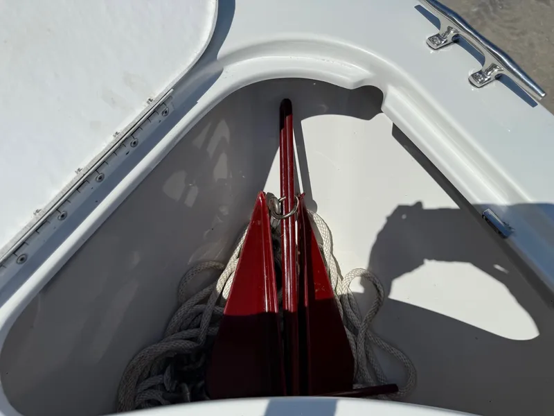 Slide: The Image of Anchor and ropes in a storage compartment of a 2001 Formula F-260 boat. - 13