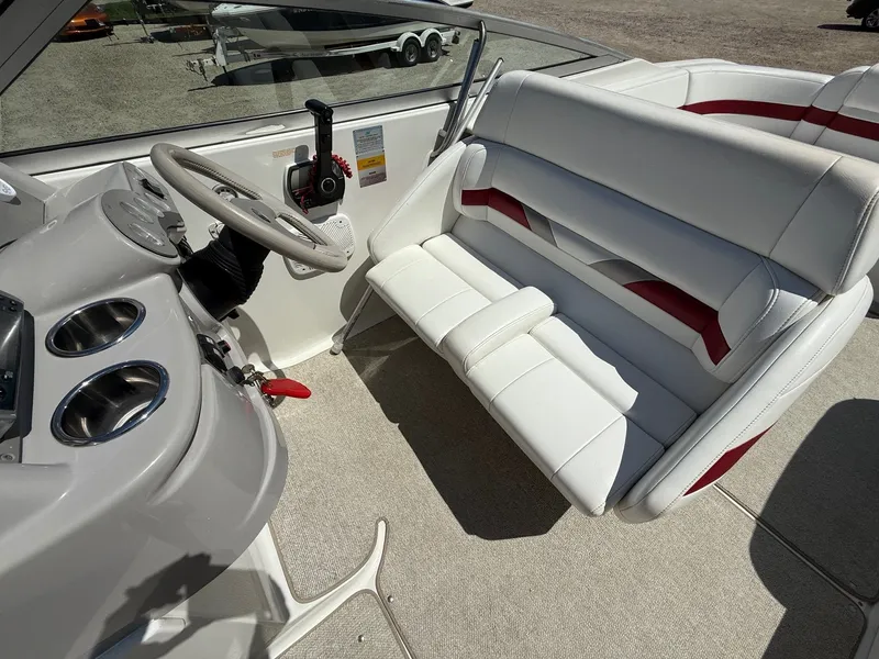 Slide: The Image of Interior of a 2001 Formula F-260 boat with white and red seating. - 15