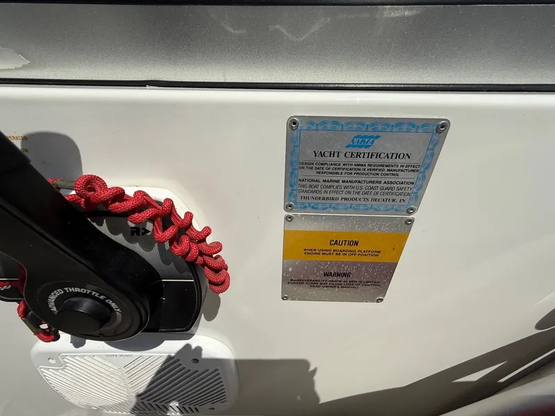 Slide: The Image of Yacht certification and caution labels on a 2001 Formula F-260 boat. - 16