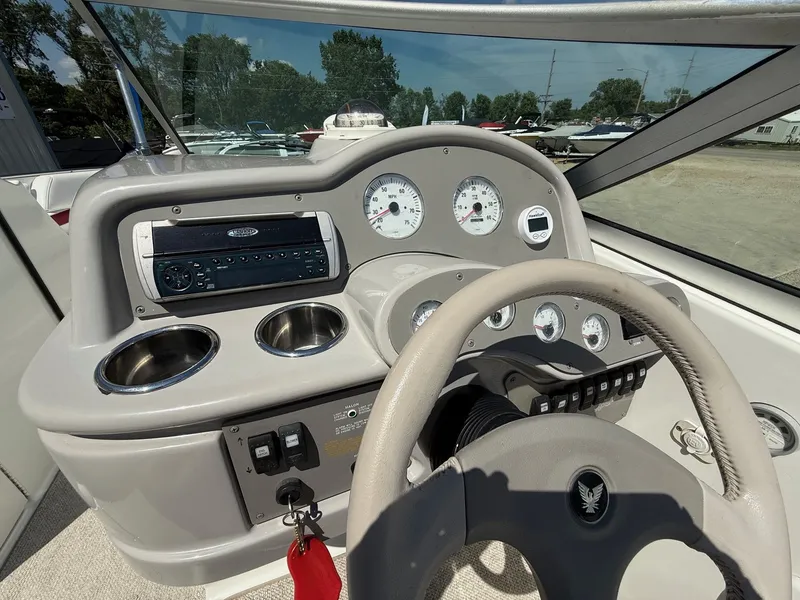 Slide: The Image of Dashboard of a 2001 Formula F-260 boat with gauges and controls. - 17