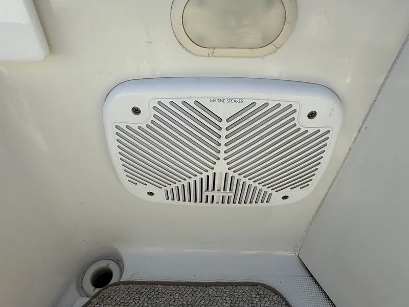 Slide: The Image of Marine speaker on a 2001 Formula F-260 boat, mounted on a white surface. - 19