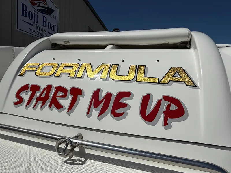 Slide: The Image of 2001 Formula F-260 boat with "Start Me Up" text on the stern. - 31