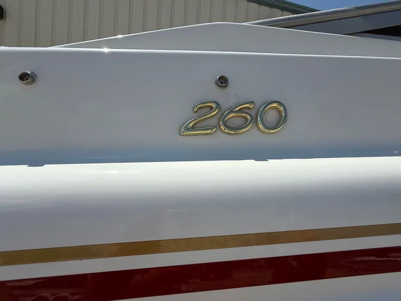 Slide: The Image of Close-up of 2001 Formula F-260 boat emblem on white hull. - 5