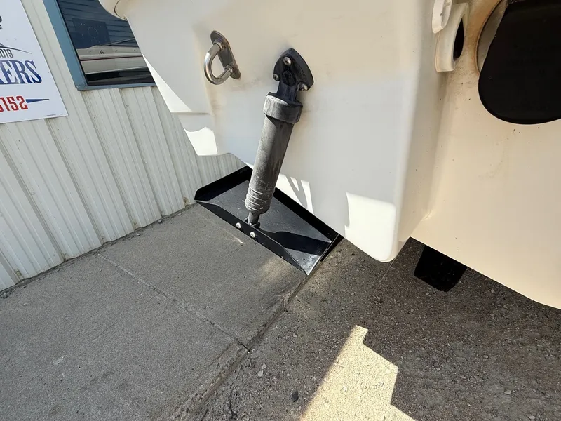 Slide: The Image of Rear view of a 2001 Formula F-260 boat with trim tab and hydraulic actuator. - 8