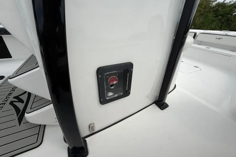 Slide: The Image of 2026 Tidewater 2300 Carolina Bay boat interior with control panel and deck details. - 29