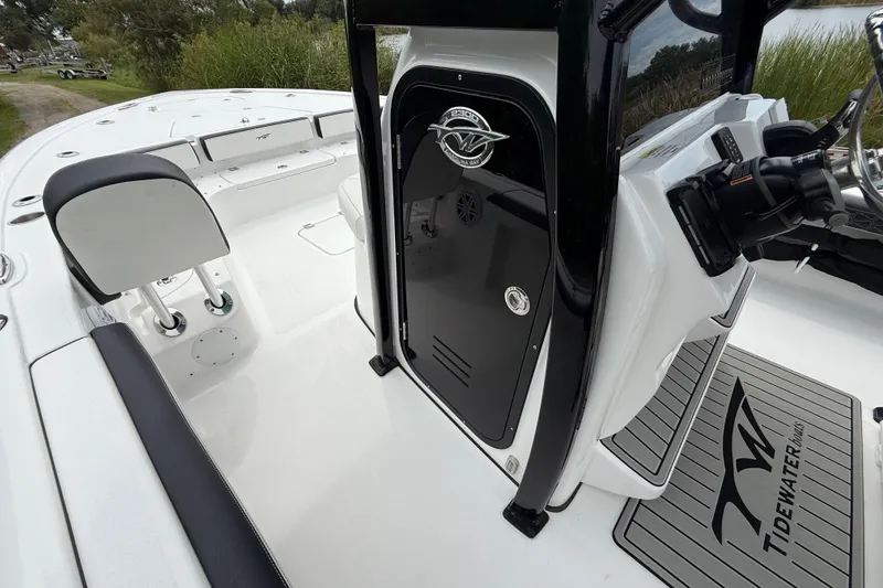 Slide: The Image of 2026 Tidewater 2300 Carolina Bay boat interior with console and seating. - 30