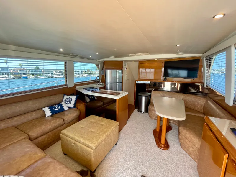 Slide: The Image of Luxurious interior of a 1998 Viking 50 Convertible yacht with modern amenities. - 28