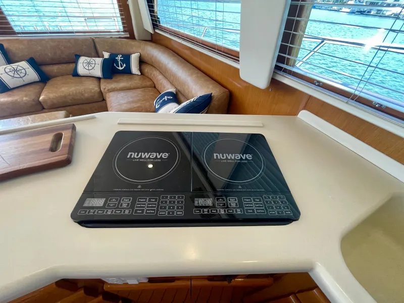 Slide: The Image of Modern kitchen in 1998 Viking 50 Convertible yacht with NuWave cooktop. - 34