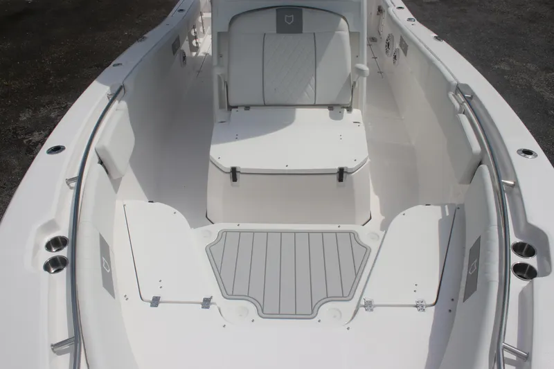 Slide: The Image of 2026 Sea Fox 288 Commander boat interior with seating and storage compartments. - 11