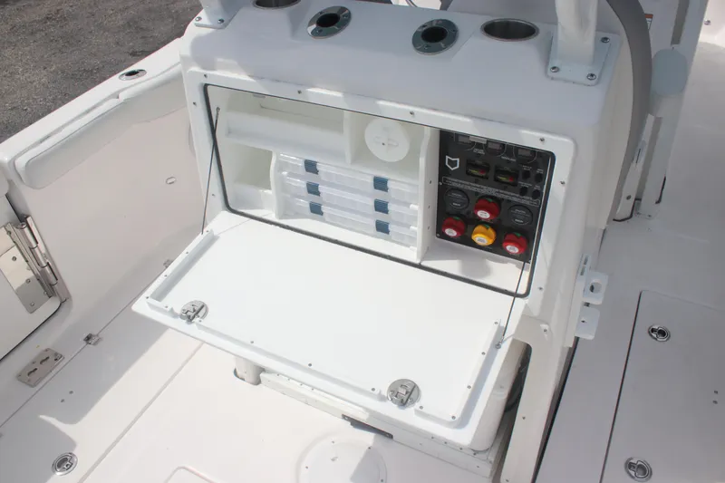 Slide: The Image of 2026 Sea Fox 288 Commander boat storage and control panel area. - 16