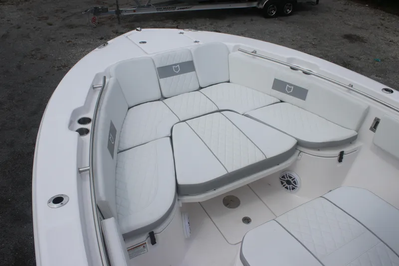 Slide: The Image of 2026 Sea Fox 288 Commander boat with spacious white cushioned seating area. - 18