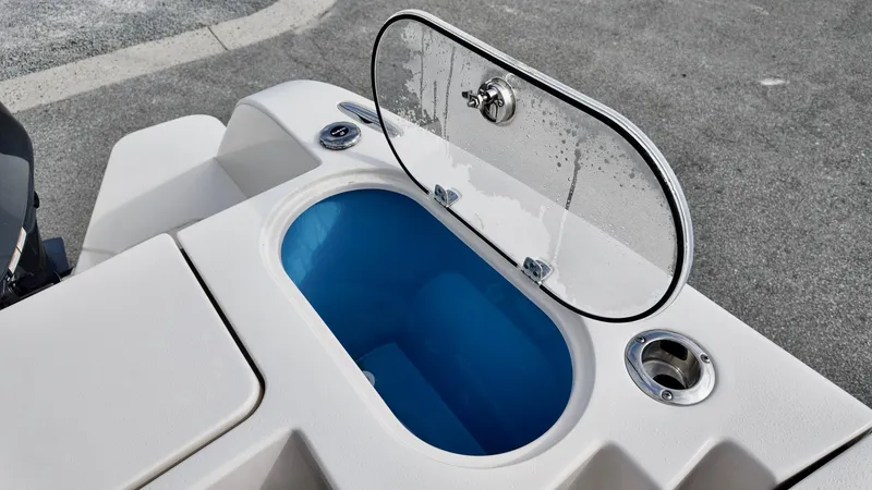 Slide: The Image of 2024 Sea Chaser 35 HFC Bluewater Series boat with open livewell compartment. - 15