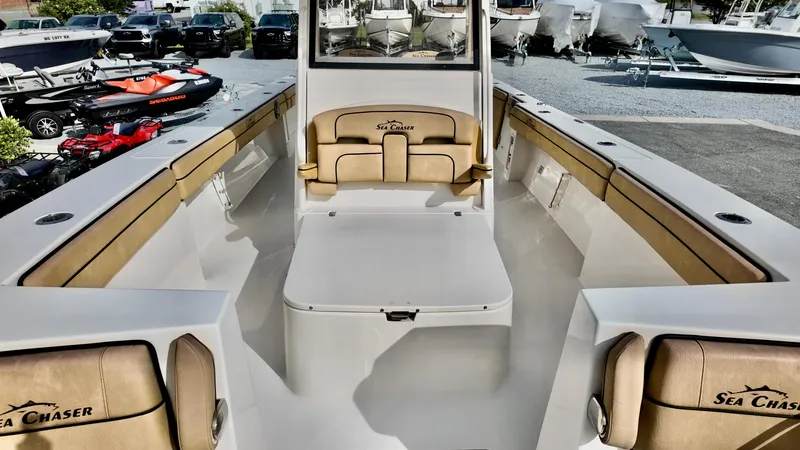 Slide: The Image of 2024 Sea Chaser 35 HFC Bluewater Series boat interior with tan seating and sleek design. - 22