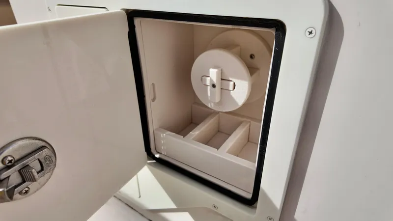 Slide: The Image of Open storage compartment on 2024 Sea Chaser 35 HFC Bluewater Series boat. - 26