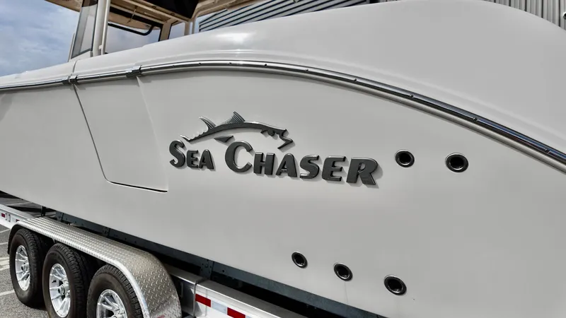 Slide: The Image of 2024 Sea Chaser 35 HFC Bluewater Series boat on trailer, side view. - 6