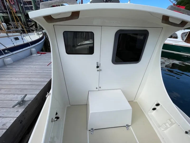 Slide: The Image of 2003 Atlas Boat Works Pompano 21 cabin interior, docked at marina. - 28