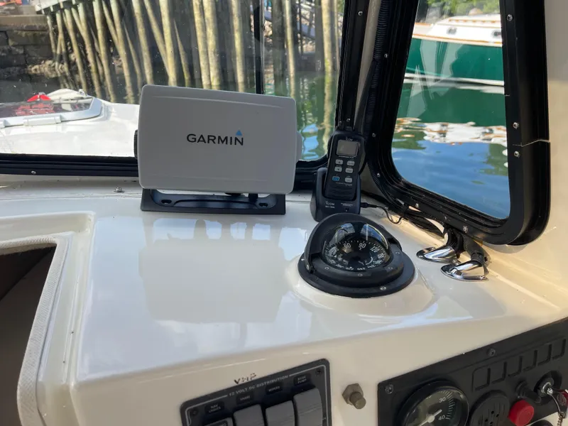 Slide: The Image of Interior of 2003 Atlas Boat Works Pompano 21 with Garmin GPS and compass. - 32