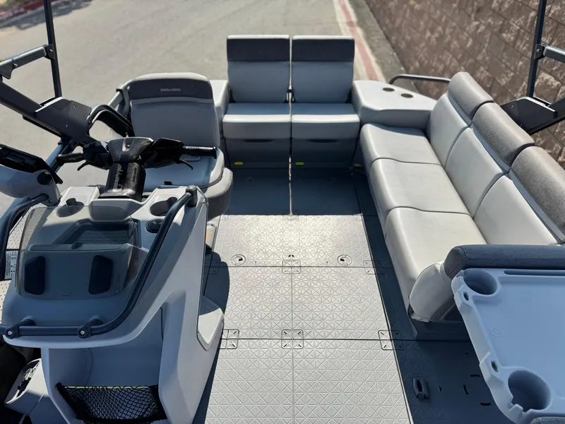 Slide: The Image of 2023 Sea-Doo Switch Cruise 18 interior with spacious seating and modern controls. - 13
