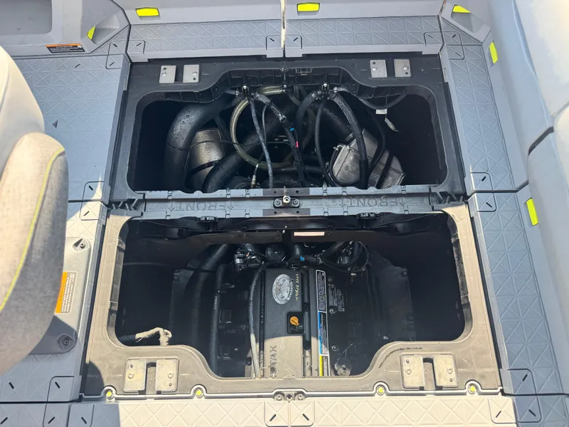 Slide: The Image of 2023 Sea-Doo Switch Cruise 18 engine compartment with visible components and wiring. - 20