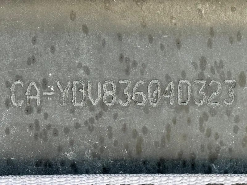 Slide: The Image of Close-up of a 2023 Sea-Doo Switch Cruise 18 hull identification number. - 22