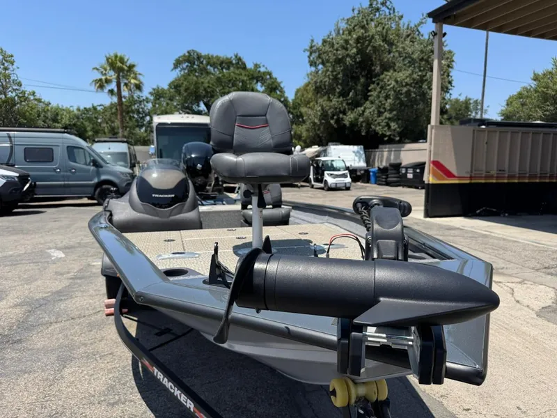 Slide: The Image of 2022 Tracker Pro Team 175 TF boat in parking lot, featuring sleek design and modern equipment. - 10