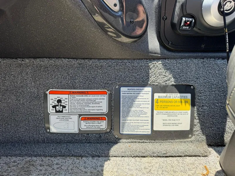 Slide: The Image of 2022 Tracker Pro Team 175 TF boat warning labels and capacity information panel. - 22