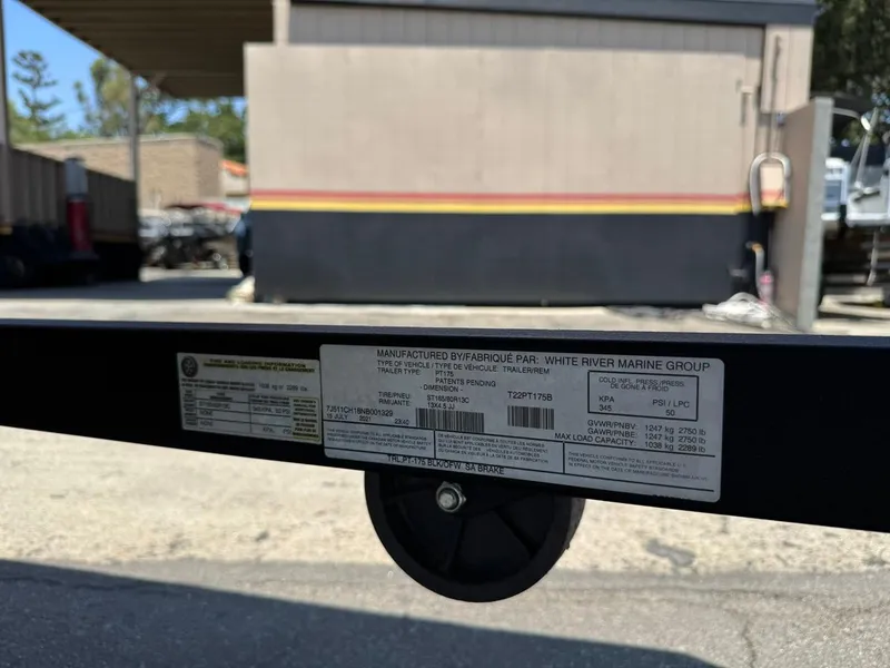 Slide: The Image of Trailer label on a 2022 Tracker Pro Team 175 TF by White River Marine Group. - 29