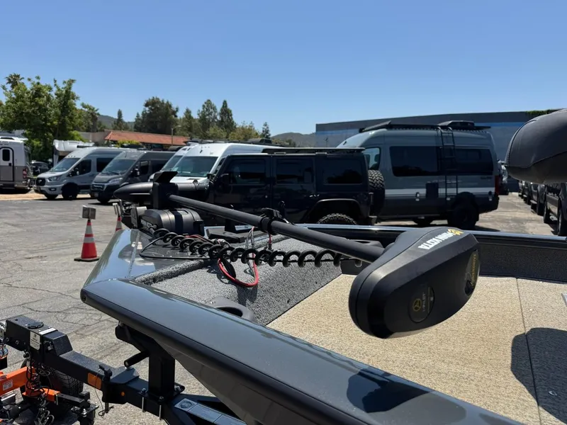 Slide: The Image of 2022 Tracker Pro Team 175 TF boat with trolling motor in parking lot. - 8