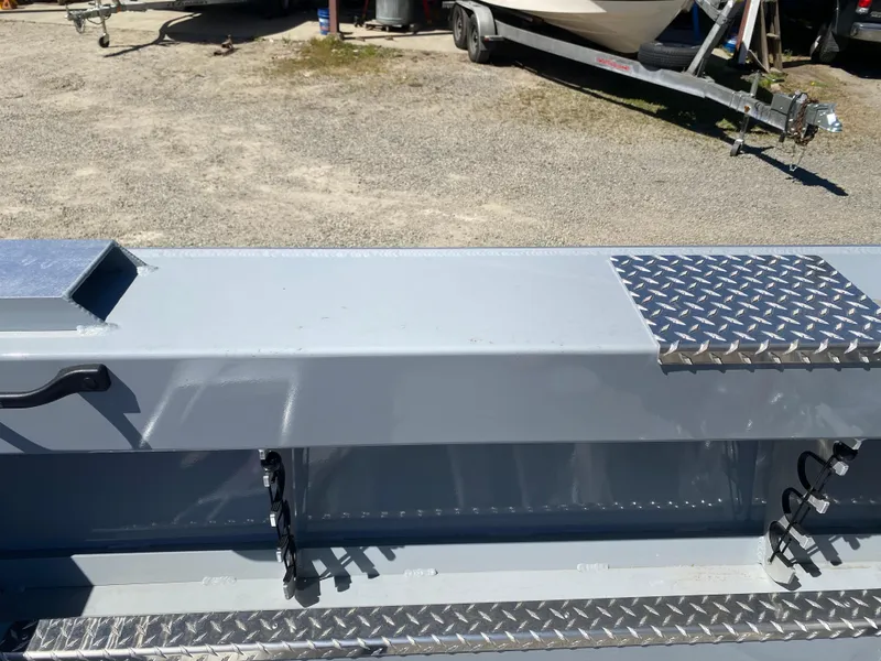 Slide: The Image of 2025 Hewescraft 190 Sea Runner HT boat interior with diamond plate accents. - 10