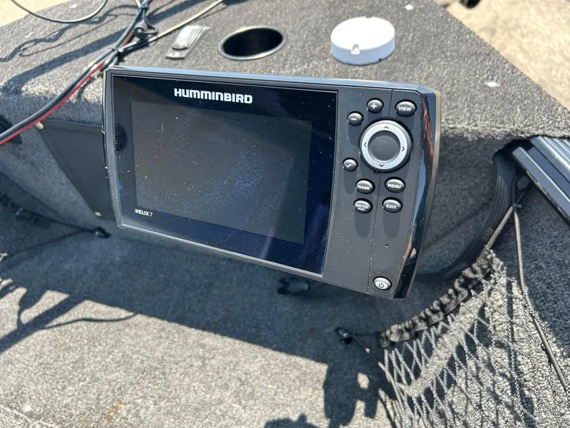 Slide: The Image of Humminbird Helix 7 fish finder on 2014 Lund 1625 Rebel XL SS boat dashboard. - 3