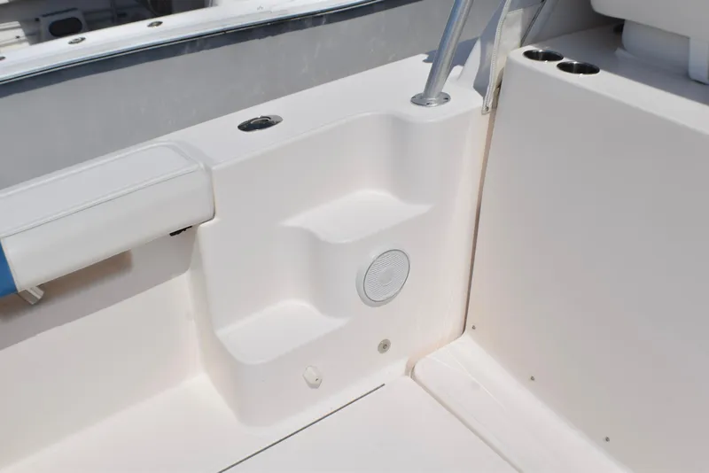 Slide: The Image of 2013 Tiara Yachts 3100 Open interior detail with speaker and cup holders. - 14