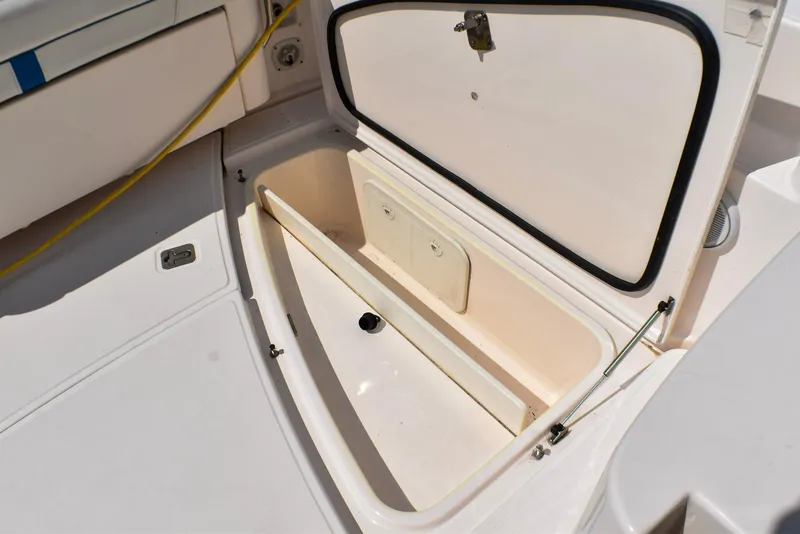 Slide: The Image of Open storage compartment on a 2013 Tiara Yachts 3100 Open boat. - 21