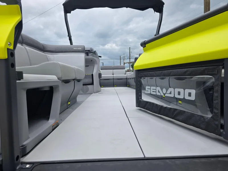 Slide: The Image of 2024 Sea-Doo Switch boat interior with spacious seating and modern design. - 5