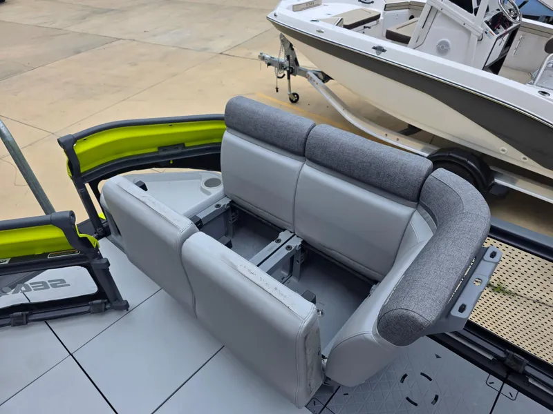 Slide: The Image of 2024 Sea-Doo Switch boat interior with modular seating and vibrant accents. - 8