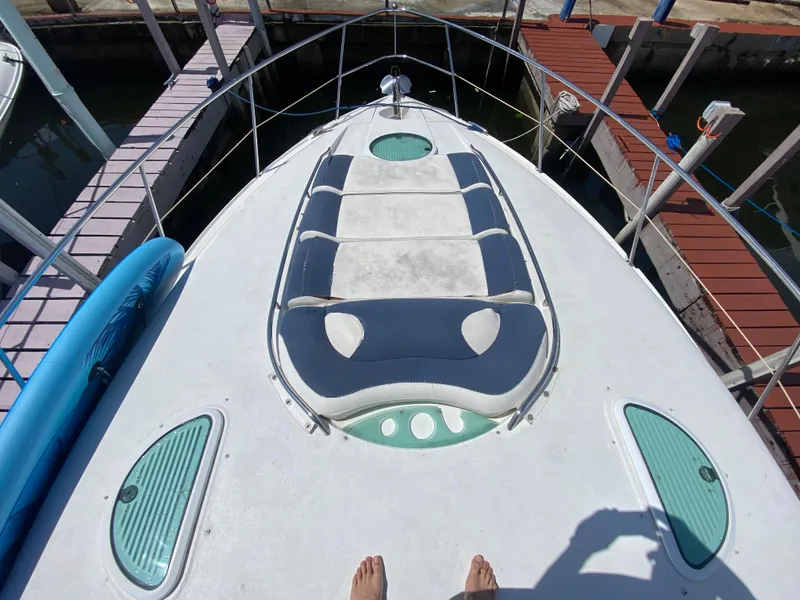 Slide: The Image of 2006 Doral 365 boat deck with seating, docked at marina. - 20