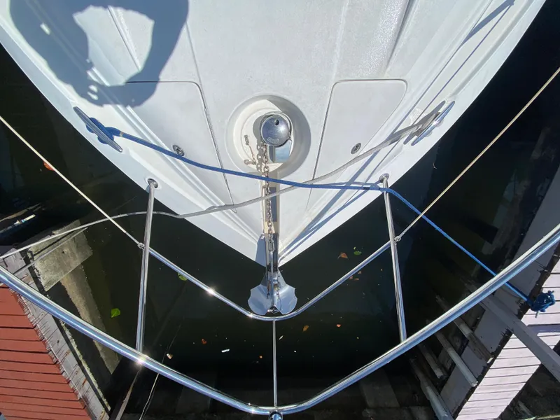 Slide: The Image of Bow view of 2006 Doral 365 boat with anchor and railing. - 21