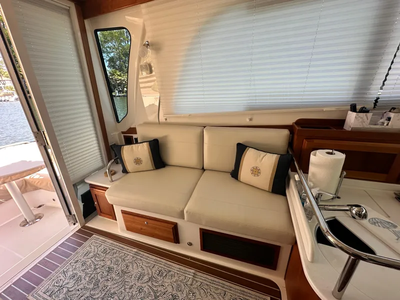 Slide: The Image of Interior of 2022 Back Cove 372 yacht with cozy seating and elegant decor. - 29