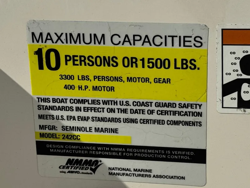 Slide: The Image of 2021 Sailfish 242 CC capacity label: 10 persons or 1500 lbs, 400 HP motor. - 29