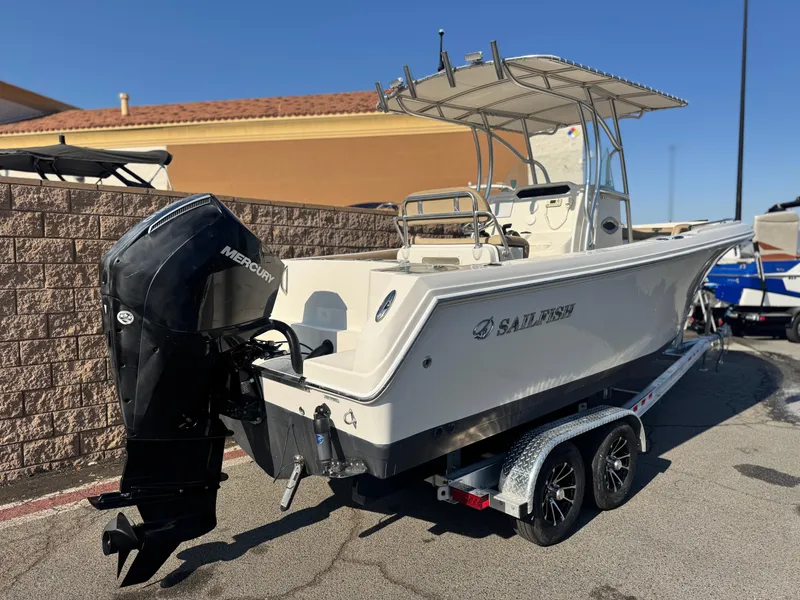 Slide: The Image of 2021 Sailfish 242 CC boat on trailer with Mercury outboard motor. - 5