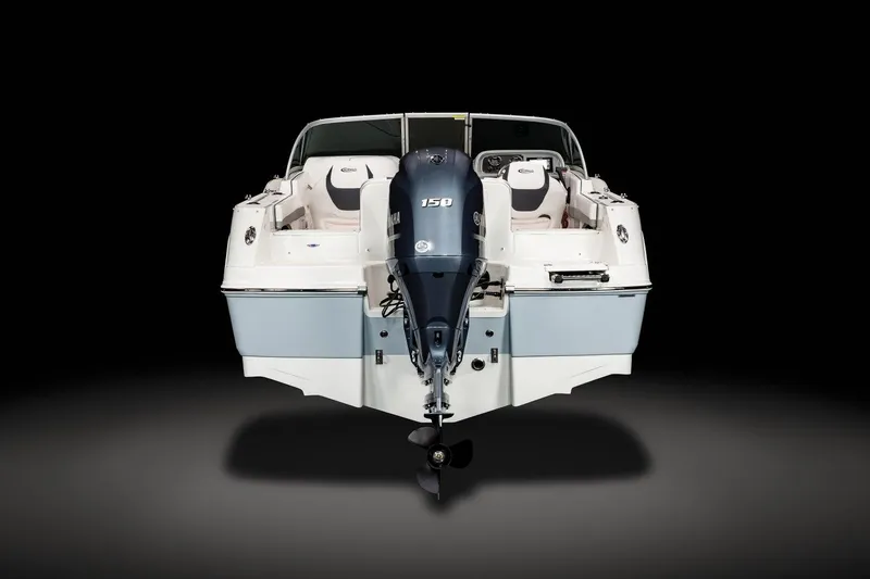 Slide: The Image of 2024 Robalo R207 Dual Console boat, rear view with outboard motor. - 16