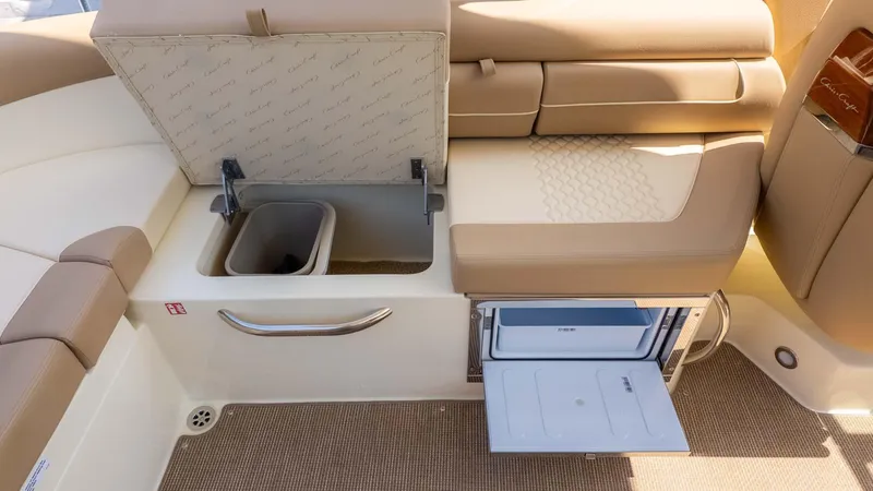 Slide: The Image of 2025 Chris-Craft Launch 28 GT interior with storage compartments and seating. - 21