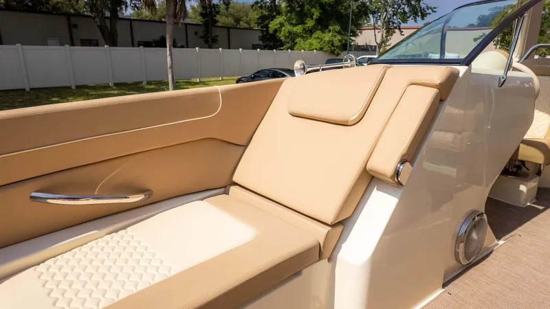 Slide: The Image of 2025 Chris-Craft Launch 28 GT boat interior with beige seating and modern design. - 30