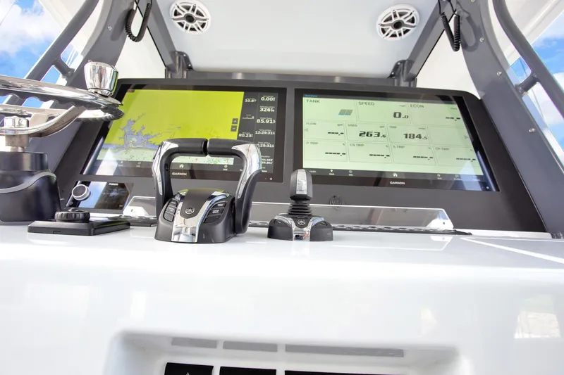 Slide: The Image of Control panel of a 2022 Freeman 47 boat with dual Garmin displays. - 35