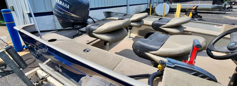 Slide: The Image of 2003 Lund 1675 Explorer SS boat interior with Yamaha outboard motor and seating. - 3